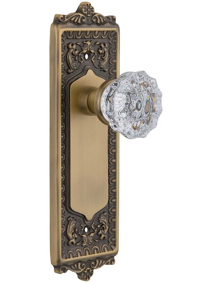 Egg and Dart Style Door Set with Fluted Crystal Glass Door Knobs Single Dummy in Antique Brass.